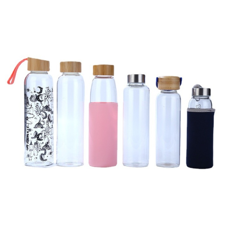 2023 Hot Sale Outdoor Portable High Borosilicate Glass Water Bottle with Bamboo Lid – Wholesale Colored Glassware Drinking Cups and Glass Water Bottle with Portable Lid price