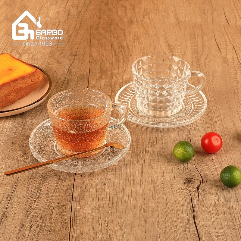 9oz Wholesale Embossed Glass Tea Coffee Milk Drinking Mug Glass Cup with Handle with Engraved Flower Pattern Customized Design for Promotion Supermarket – Coffee Glass Cup Saucer Set and Glass Coffee Cup Saucer Set price