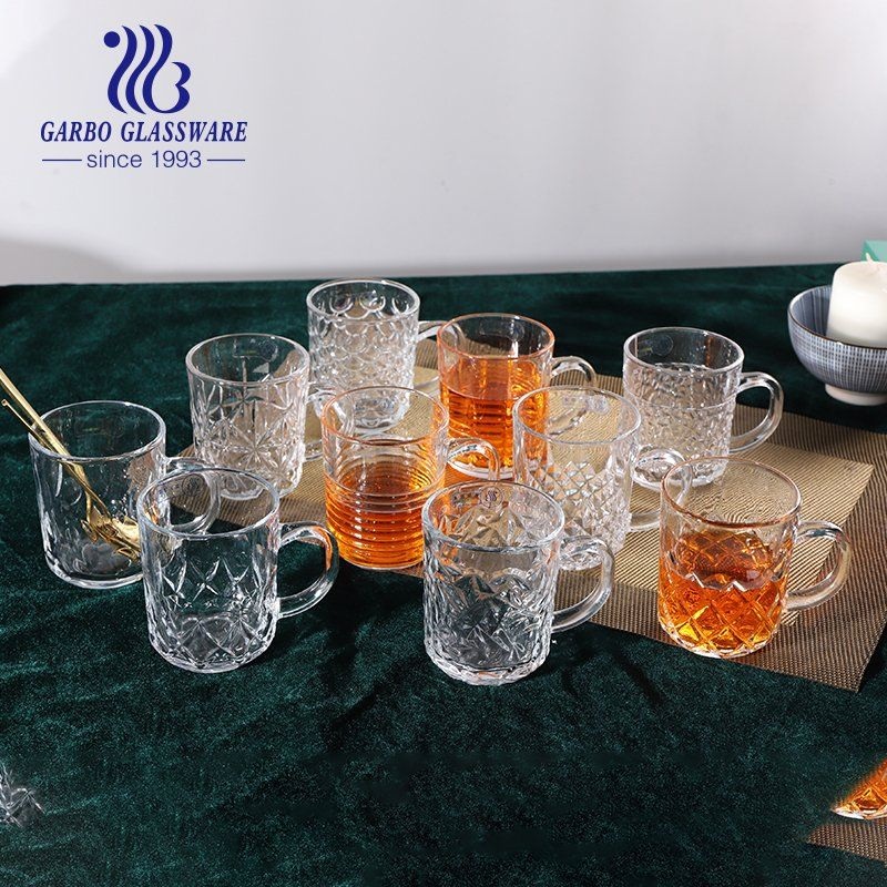 Factory Classic Cheap 8oz Embossed Tea Drinking Cup Clear Glass Mug with Handle – Glass Mug and Glass Tea Mug price
